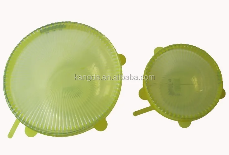 Ultra Stretchy Silicone Super Stretch Lids to keep food fresh. Locks in freshness air tight - Adjusts to shape and size of con