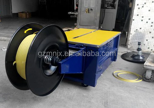 Guangzhou MingNa transpak pp packing slipper banknote carton pp strap pressure type plasticpet strap machine