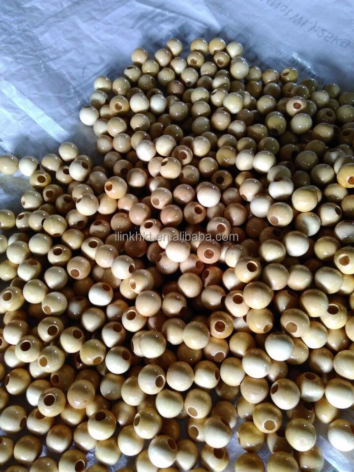 
Wooden balls with holes 