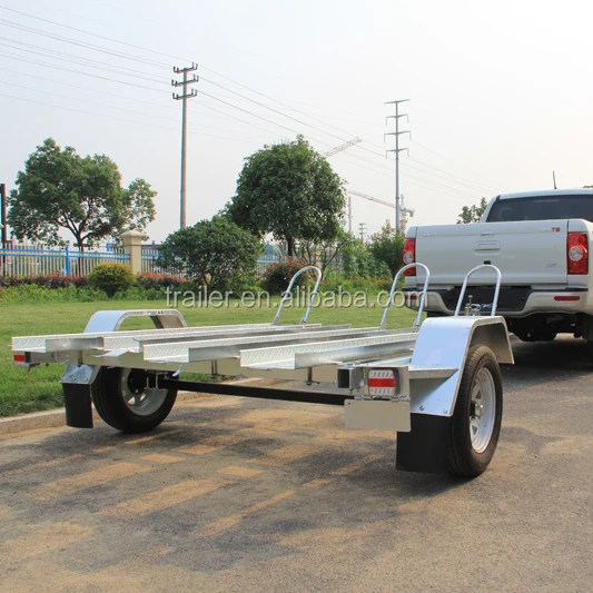 3 Motorcycles Transporting Trailer