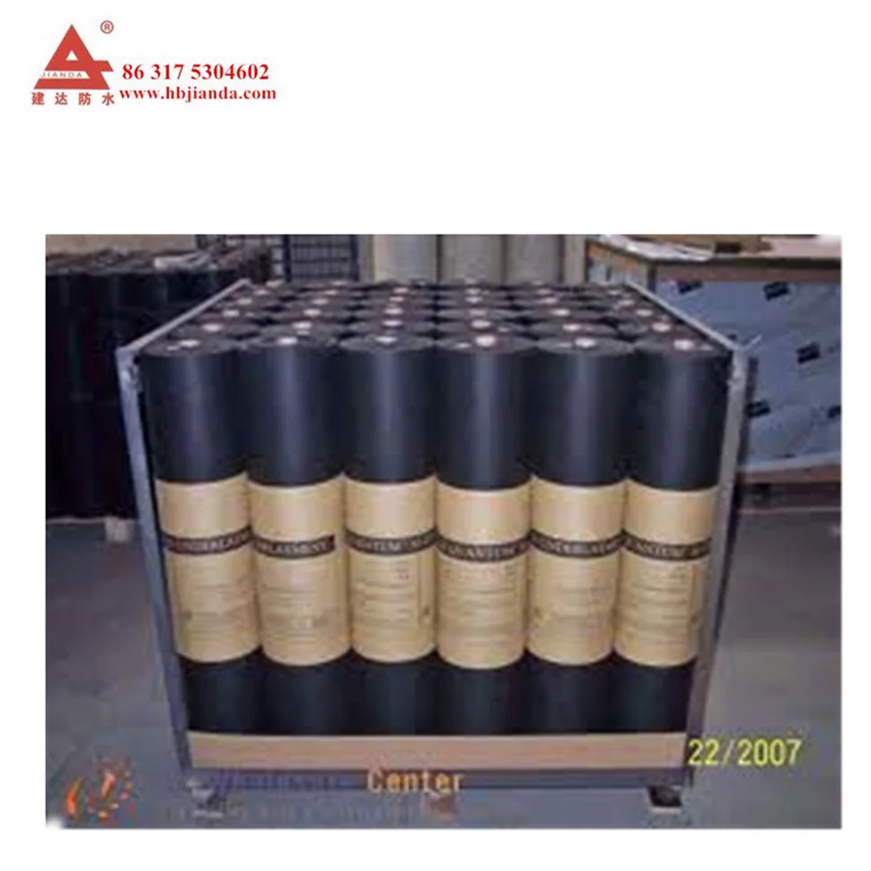 ASTM Asphalt Paper Rolling out the asphalt saturated felt paper in line with the drip edge