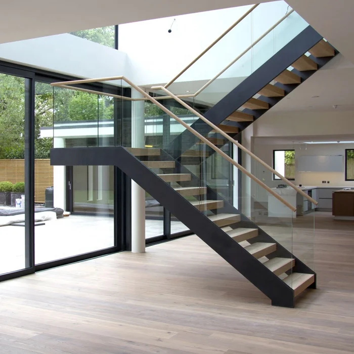 Hard wood steps and tempered glass railing Interior Steel wood staircase