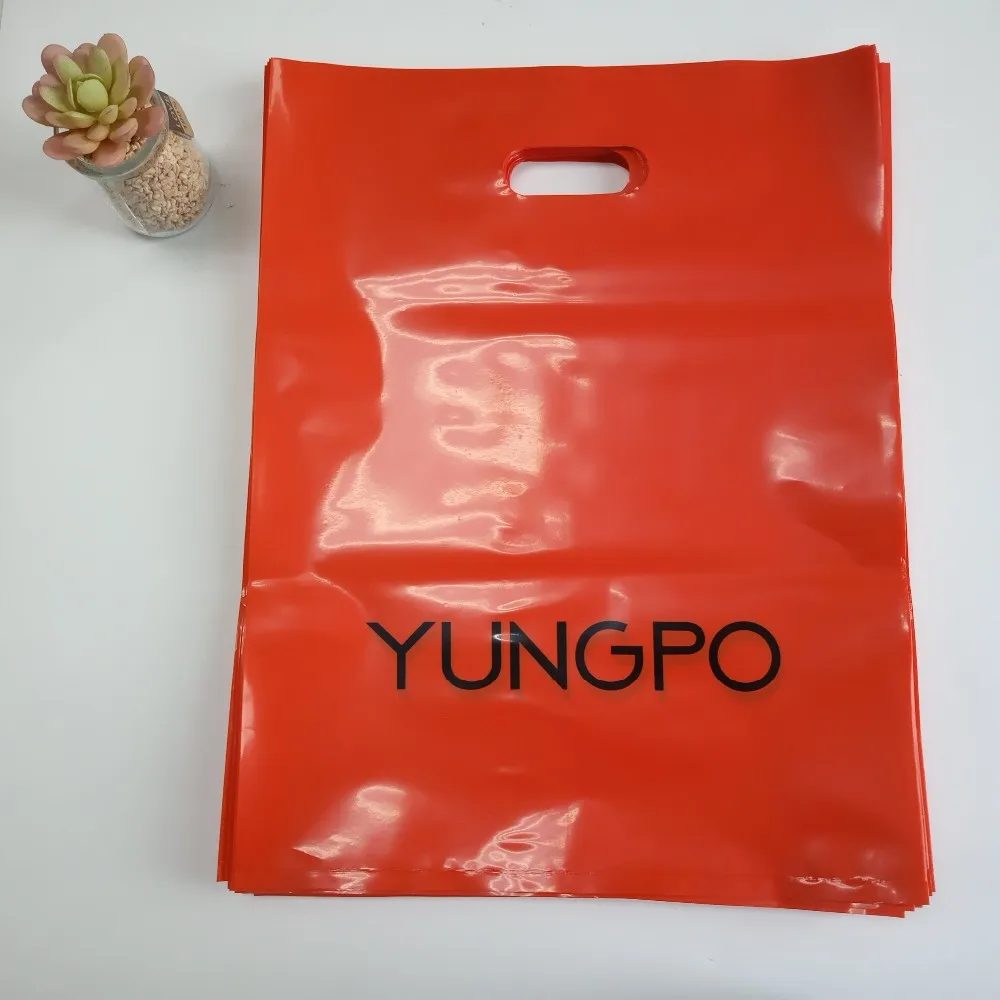Wholesale plastic die cut handle shopping bag,good quality plastic shopping bags for sales