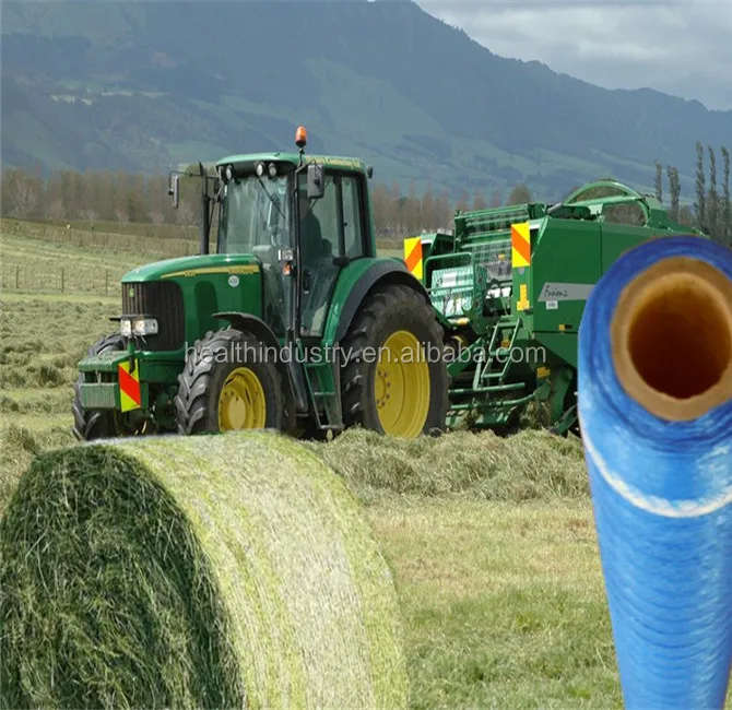 Белый и темно-зеленый шелковый тюк netwrap