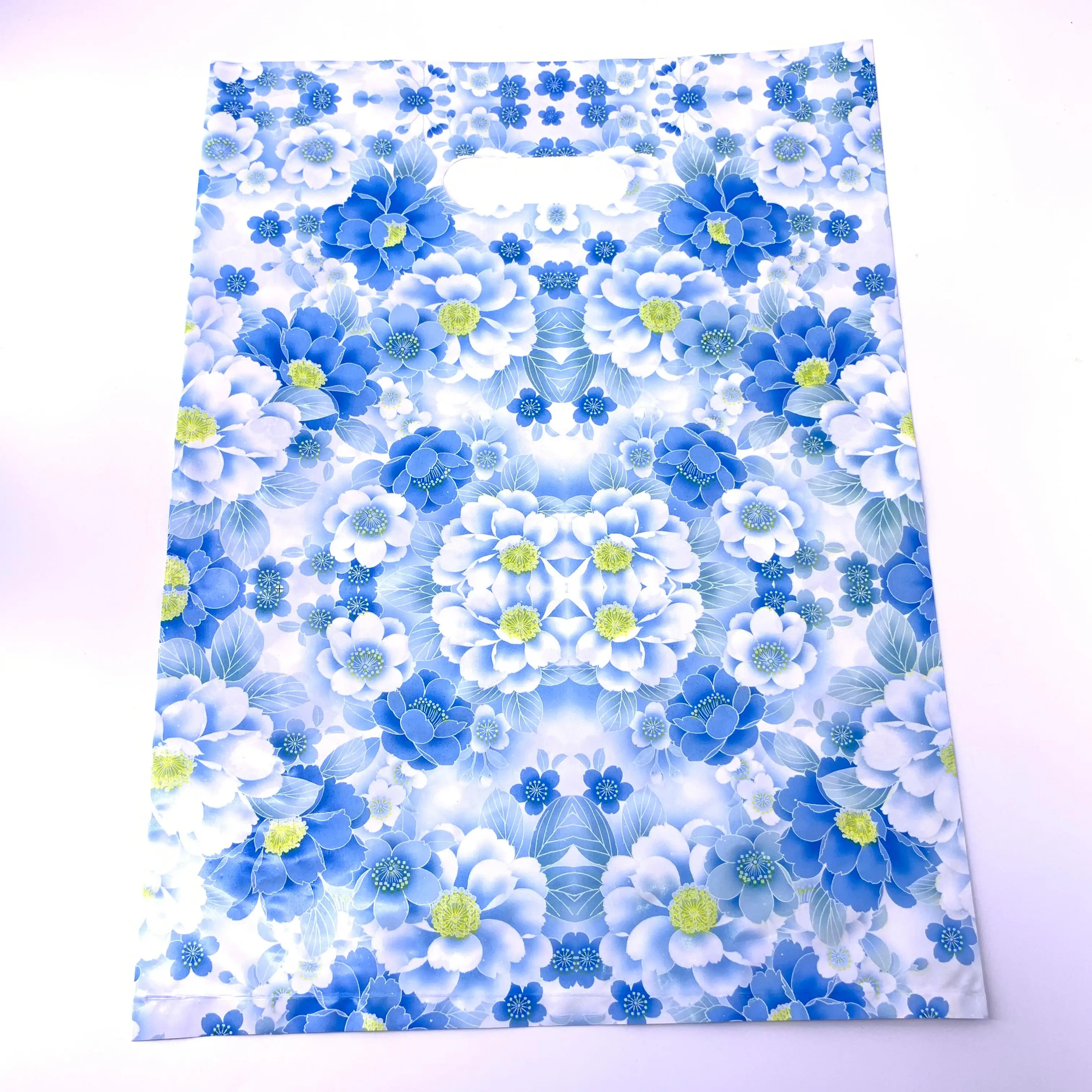 Custom made handle die cut plastic bags