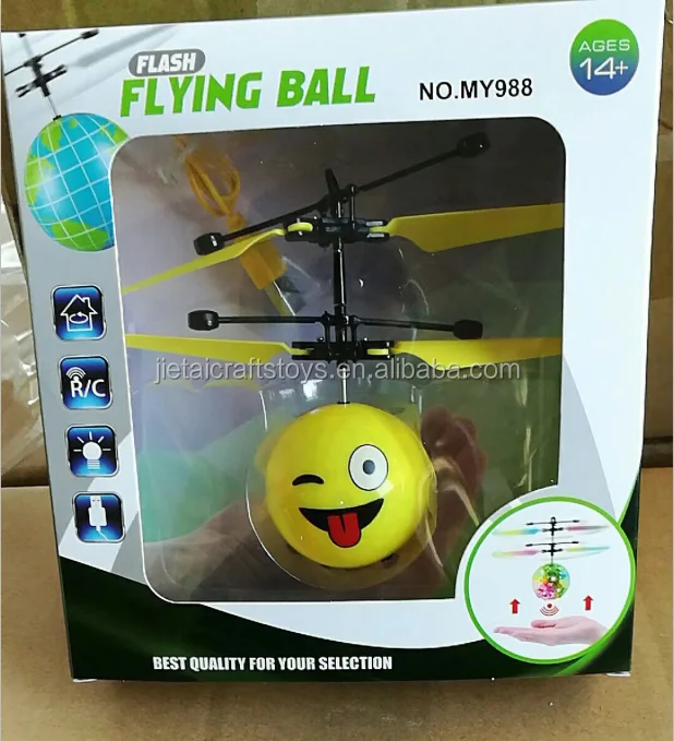 Hot sell induction toys flying ball with light Expression face design sensor flying ball