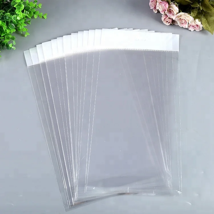 Прозрачный пластиковый полиэтиленовый пакет с белым заголовком и логотипом на