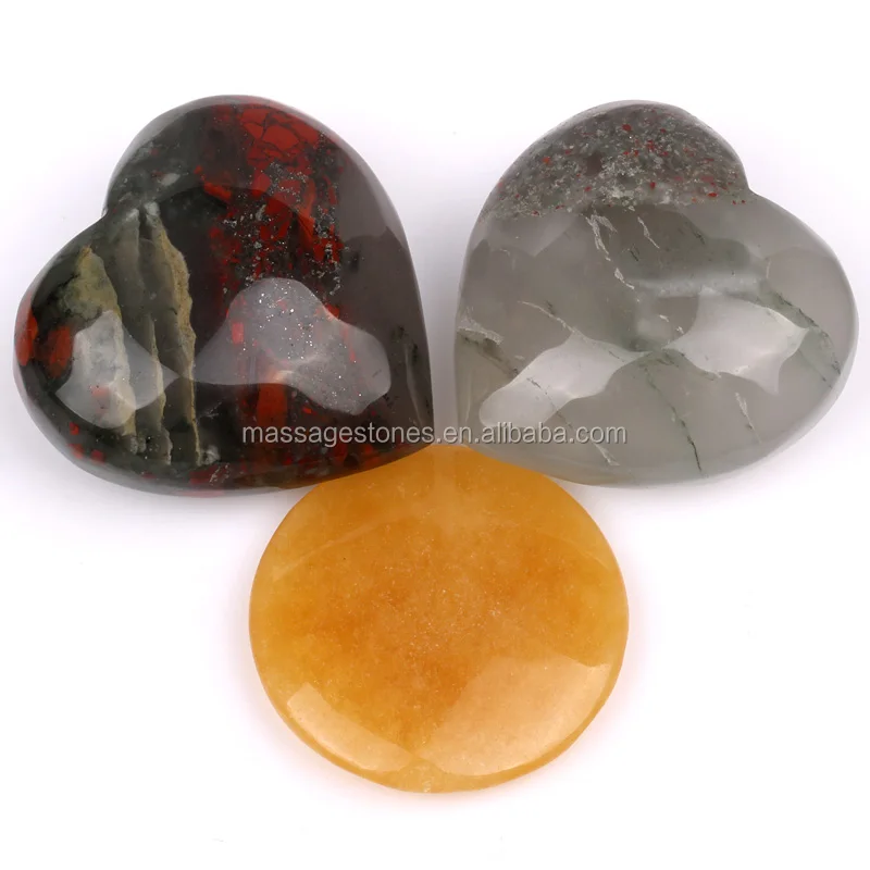 Natural palm stone yellow jade natural heart caving stone wholesale