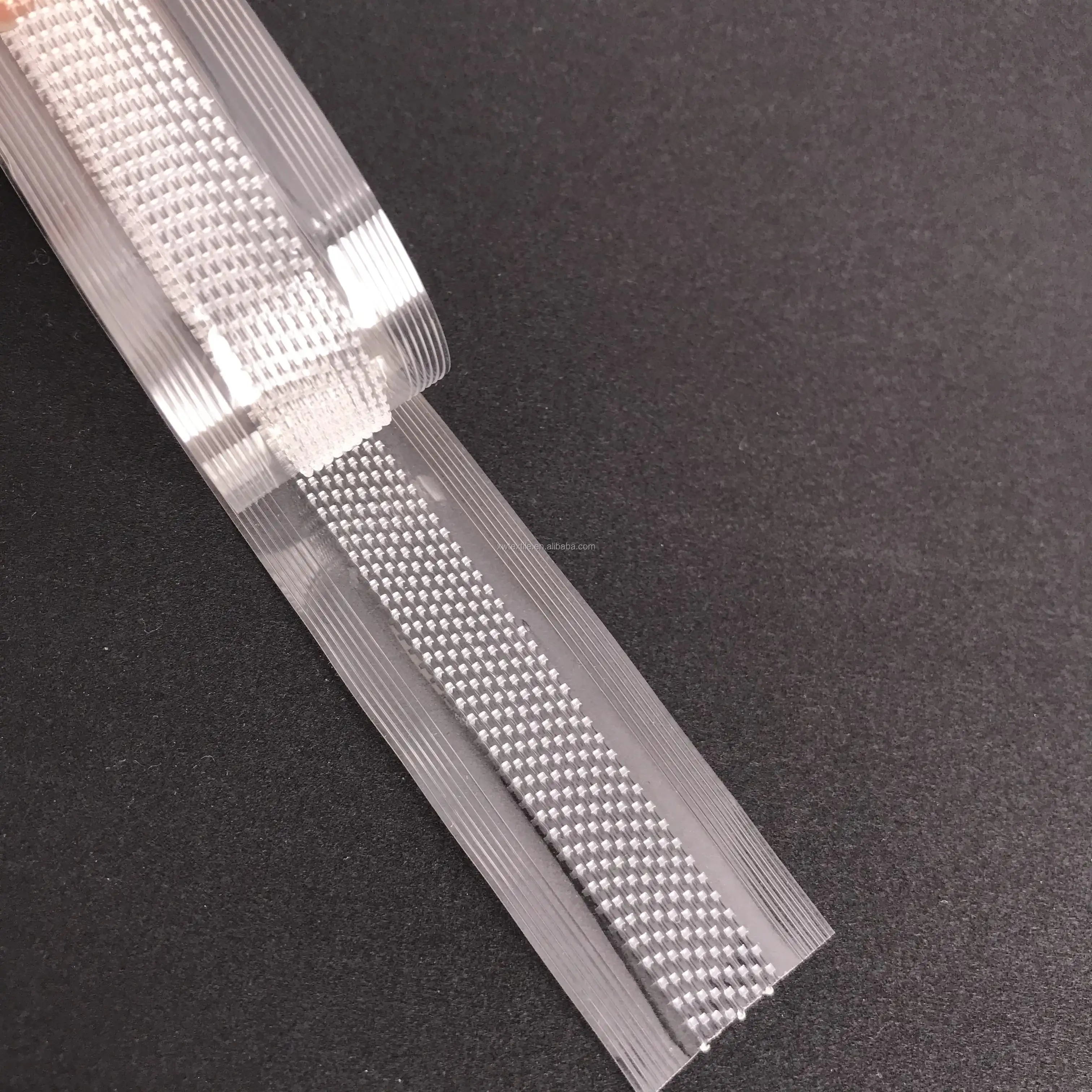 HOOK-TO-HOOK FLEXIBLE PACKAGE CLOSURE SYSTEM WITH SEALANT LAYER