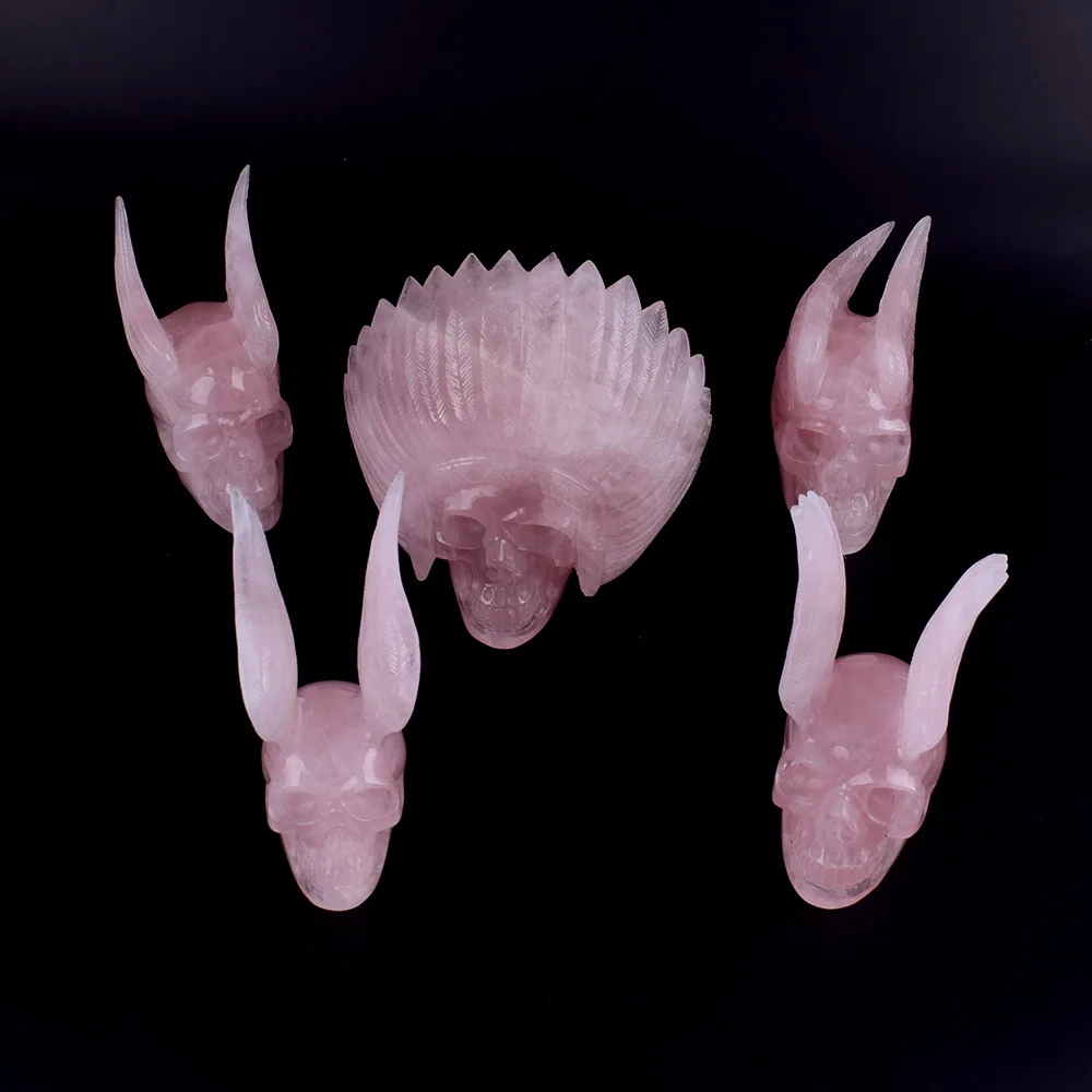 Natural rose quartz crystal hand carved Alien and Wing skull Sculpture for sale