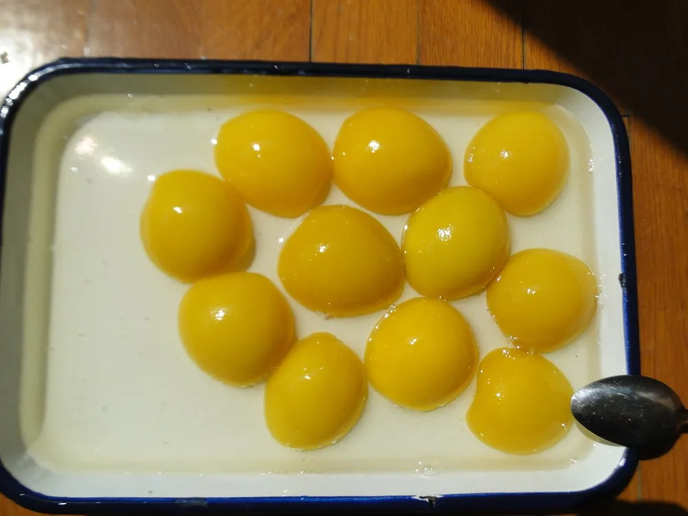 Недорогие консервированные желтые персиковые половинки хорошего качества