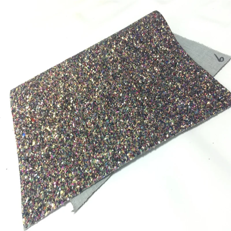 
Chunky Glitter Faux Leather Fabric With Coloful Glitter Pieces For Bows 