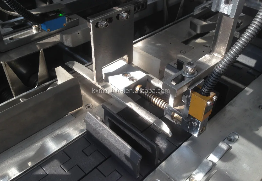 
high speed box packaging machine for sachets with multi auto loader 
