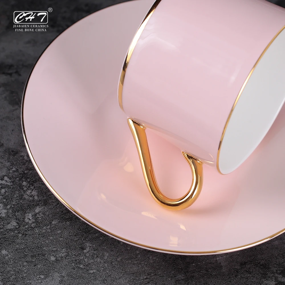 Customize Wholesale Ceramic Tea Cup Set Golden Rim Handle Design Fine Bone Pink Coffee Cup and Saucer