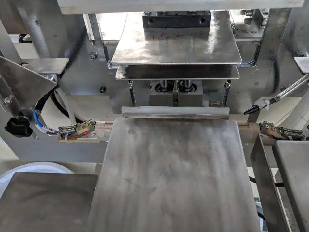 
Napkin tissue paper bag packing machine price 