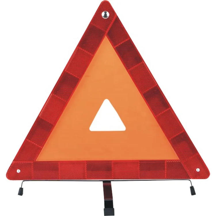 Red dot safety car triangle road sign / Vehicle warning triangle in car