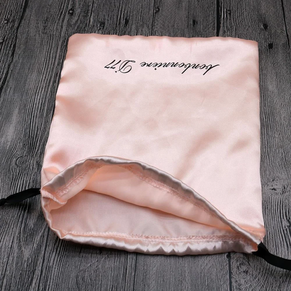 Pink satin bags for hair extensions with logo printed
