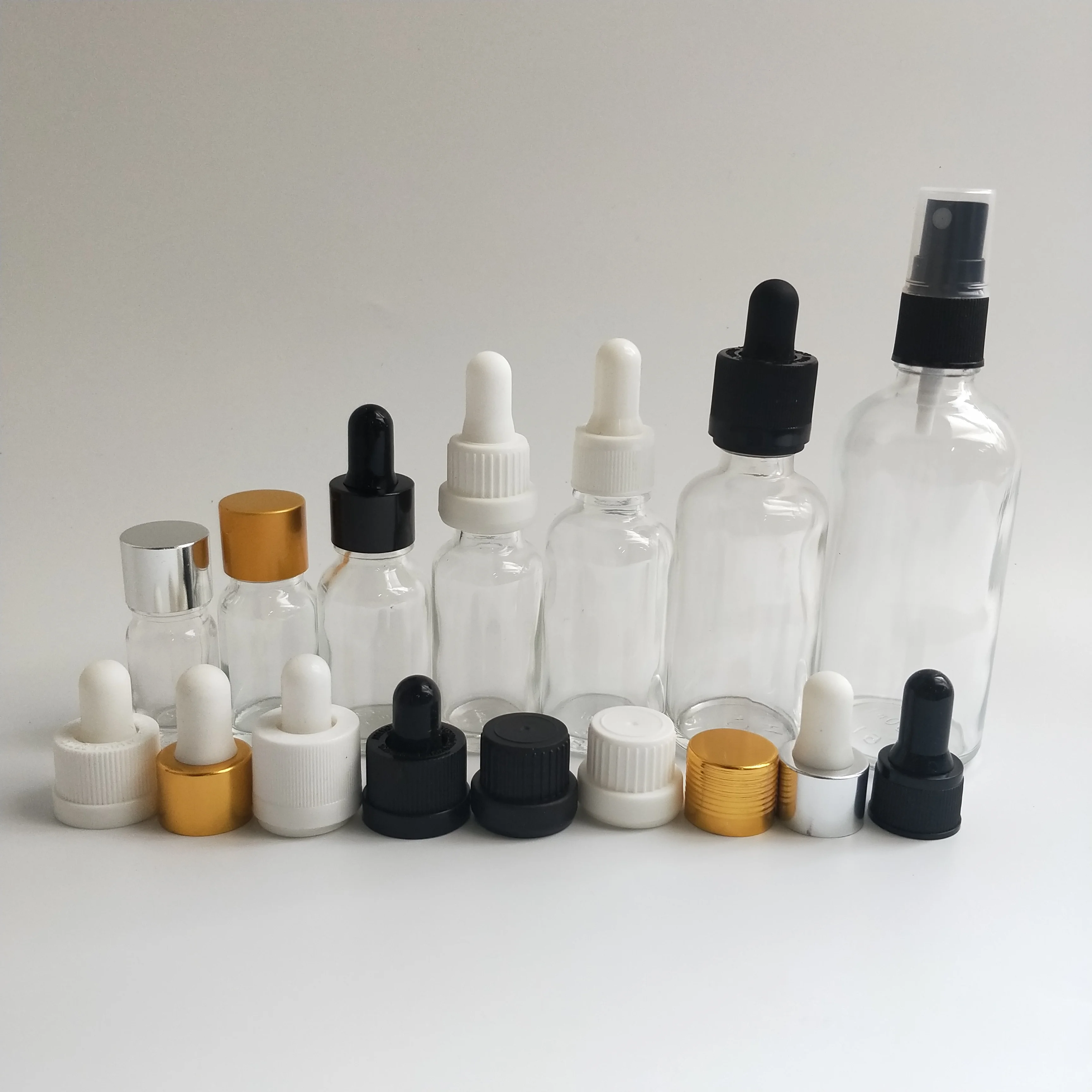 Clear glass bottle, clear oil bottle with perfume spray and dropper cap