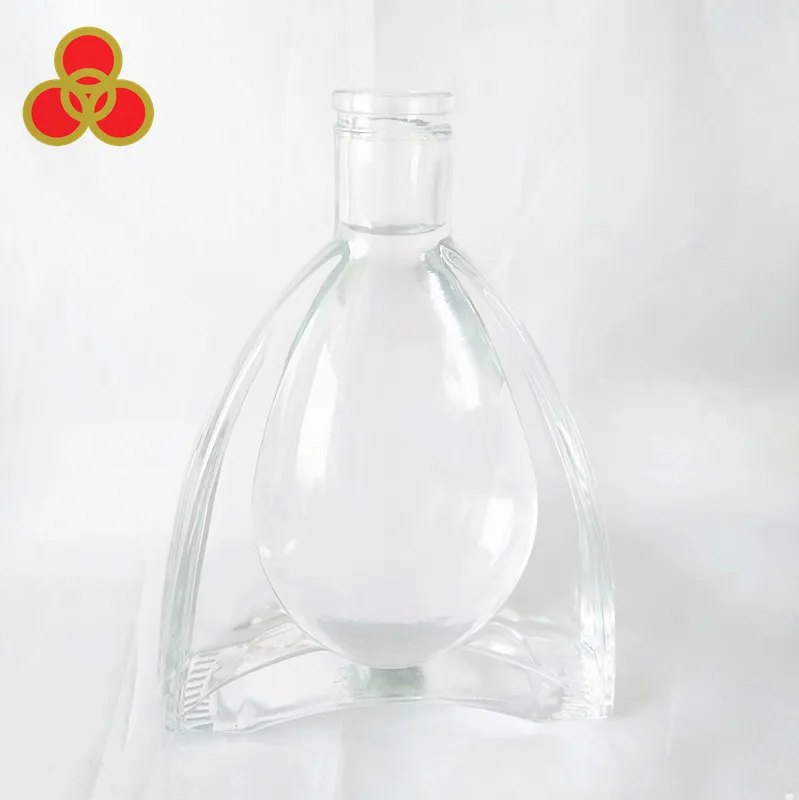 
Wholesale 700ml unique shape glass bottle for XO/brandy bottle with crown cap 
