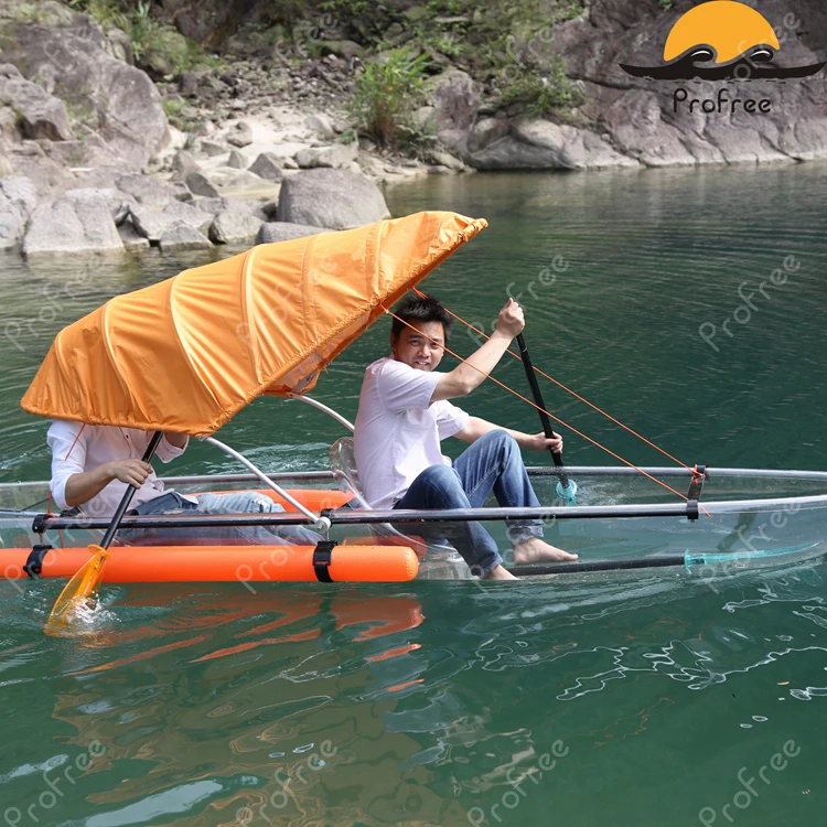 
transparent kayak with outrigger and airbag ans fishing life jacket 