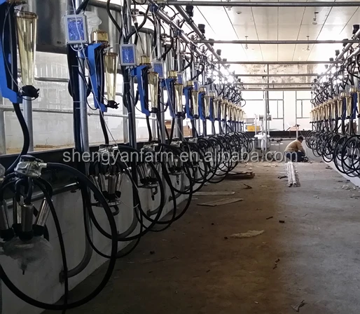 Flow meter milking parlor for dairy farm milking with automatic cluster remover