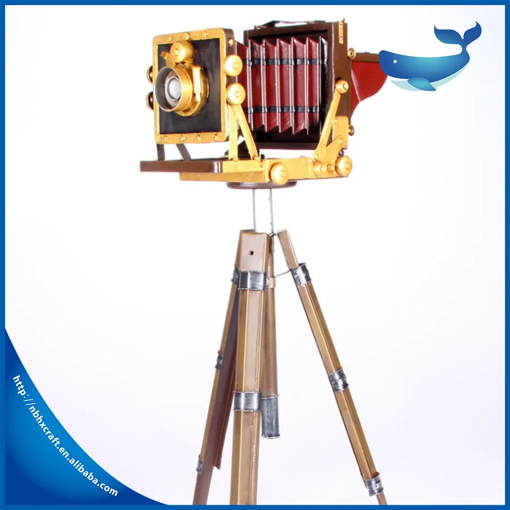 Vintage iron tripod camera model