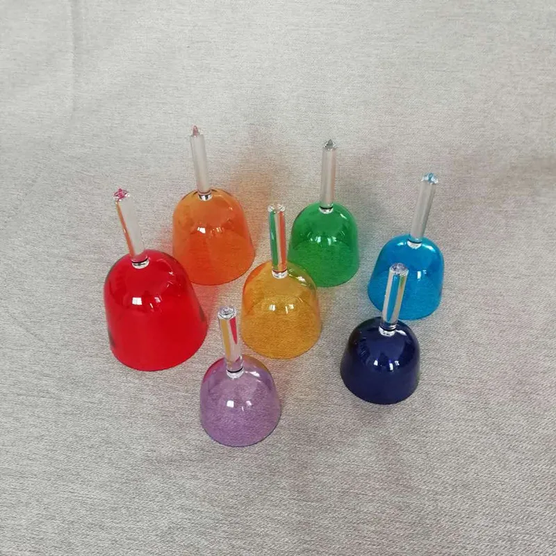 
HF Wholesale chakra tuned crystal singing bowl set sound healing Clear colorful hand held crystal singing bowl with handle 