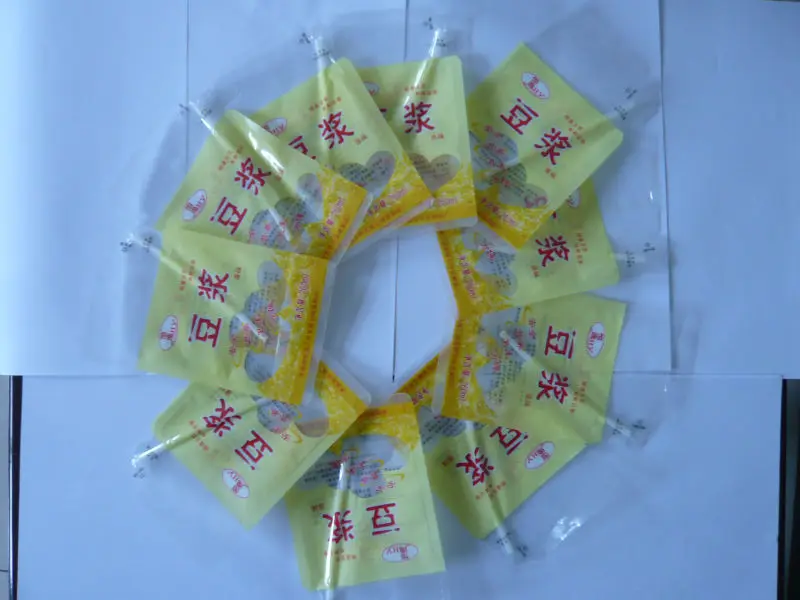 sweet water /Juice/ Straw Milk Inflatable Bag Fill Packer filling machine for plastic sachet bags