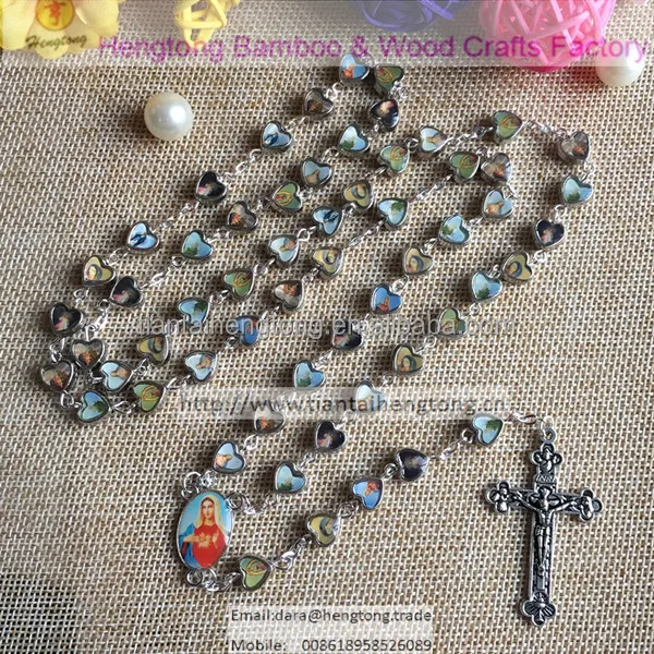 mix catholic figures on alloy heart rosary which is mixed with saint icon and virgin mary centerpiece