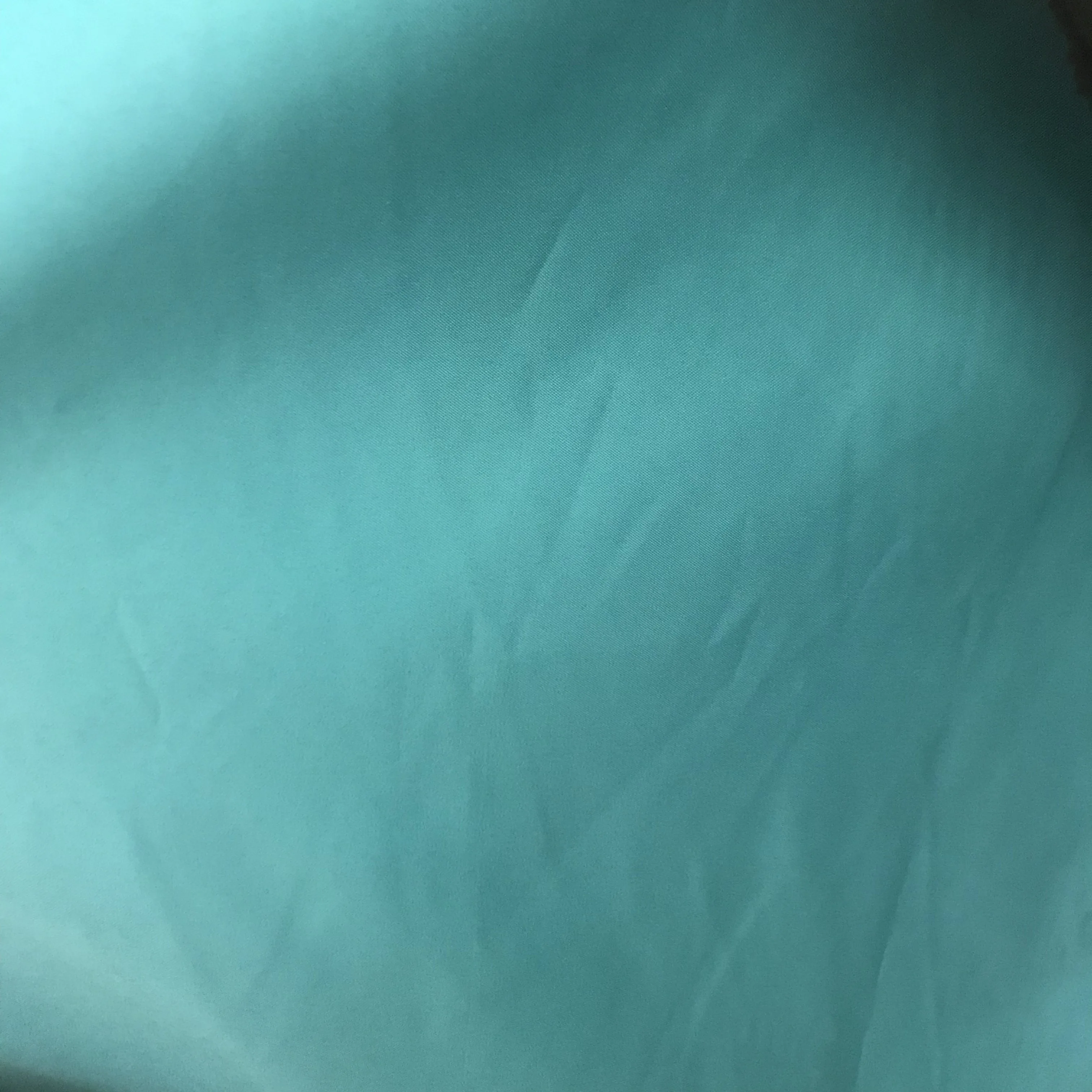 70% вискоза, 30% мериносовая шерсть, Однотонная футболка с спандексом