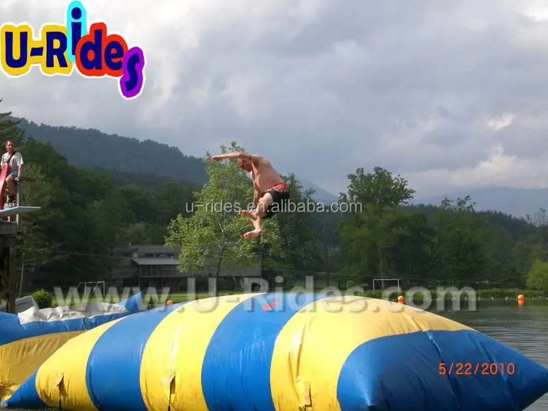 Custom lake water game 10 meter long air sealed water jumping pillow blob inflatable water catapult blob for kids and adult