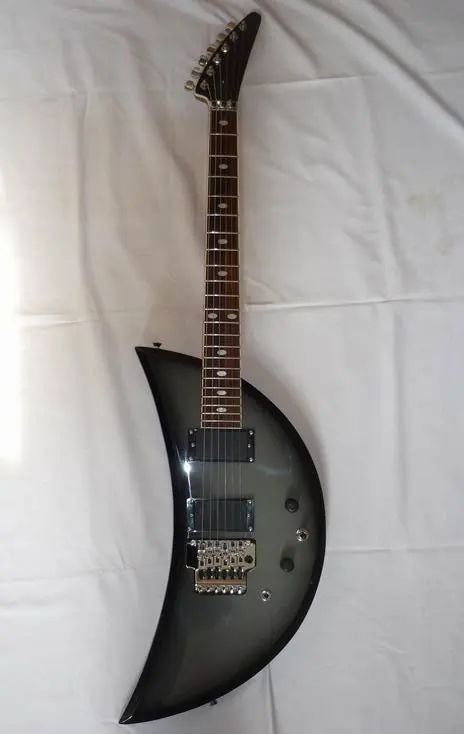 Unusual Crescent-shaped Electric Guitar