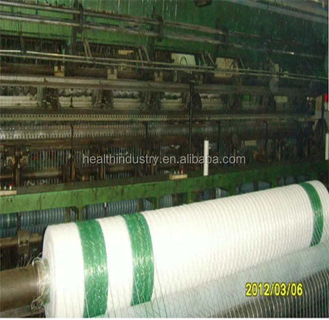 Белый и темно-зеленый шелковый тюк netwrap