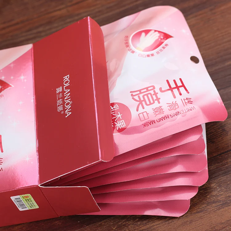 Лидер продаж увлажняющая отбеливающая маска для рук rolanjona