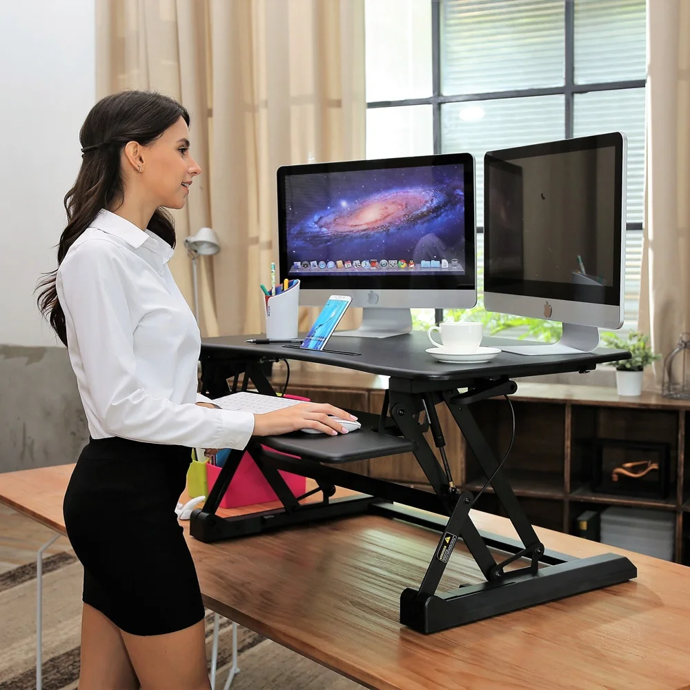 Standing desk converter riser with keyboard for standing