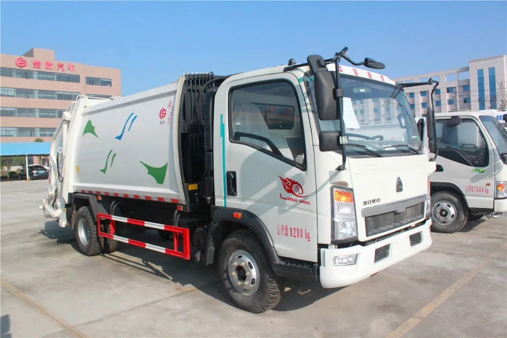 Sinotruk Howo 4x2 waste collection truck 3-5 cubic meter compactor garbage truck price
