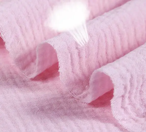 
Custom color on solid color crinkle double gauze fabric 