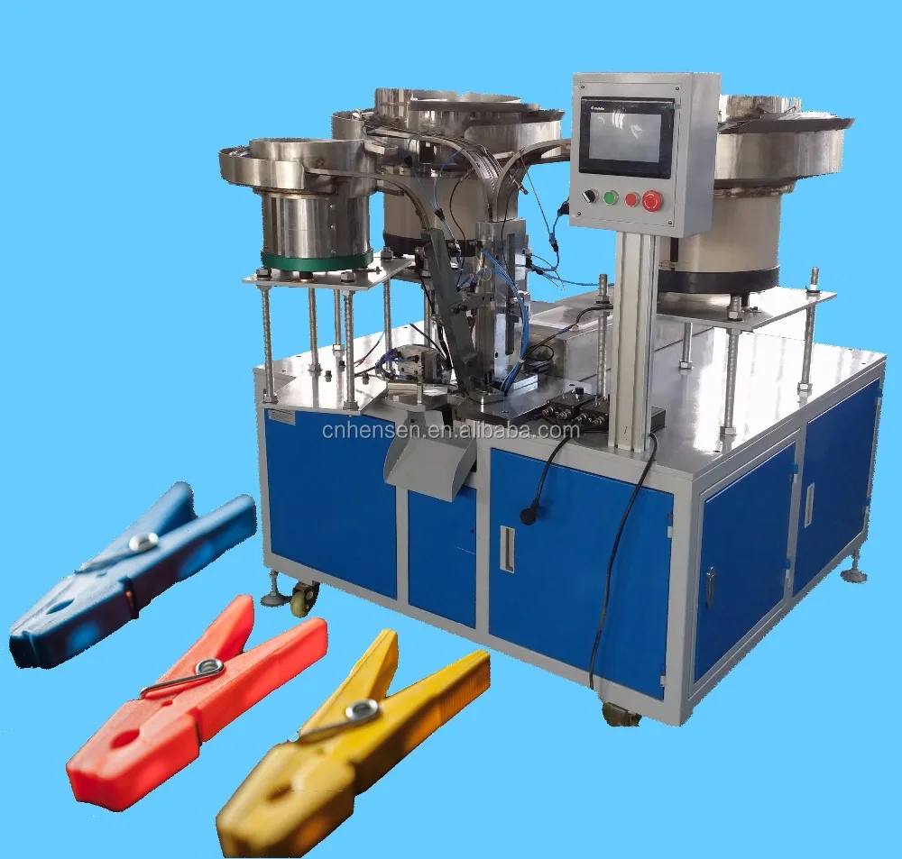 Автоматическая машина для сборки пластиковых прищепок