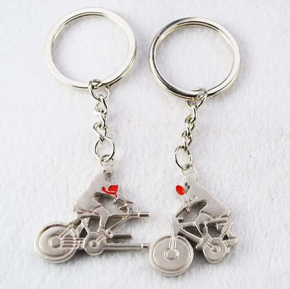 
Asia China Factory Wholesale Custom OEM Alloy charms moto pendant keychain 