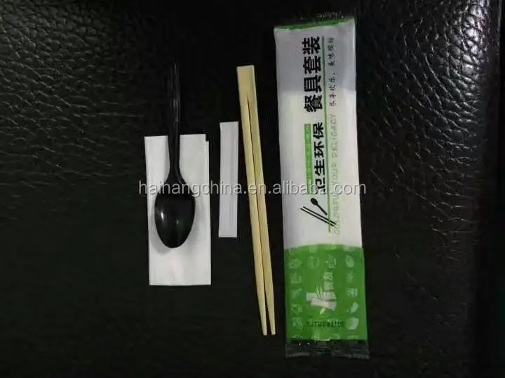 Multi-function paper napkin and plastic airplane cutlery plastic wooden spoon automatic packaging machine