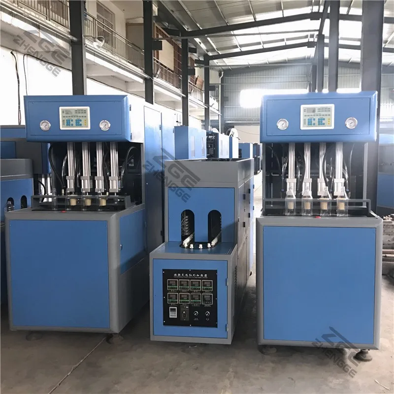 4 Cavity automatic dropping the bottle Semi Automatic Pet plastic bottle blowing machine