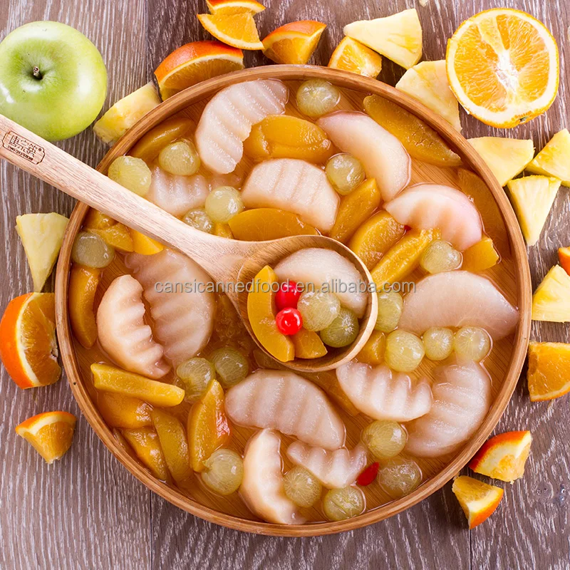 Тропические консервированные смешанные фрукты коктейли в легком сиропе