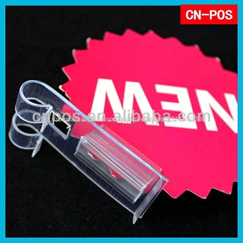 супермаркете пластиковой полкой дерёатель-клипса