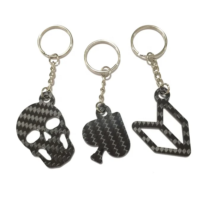 Professional carbon fiber custom made cnc machining skull shape custom carbon fiber keychain, OEM custom carbon fiber gifts