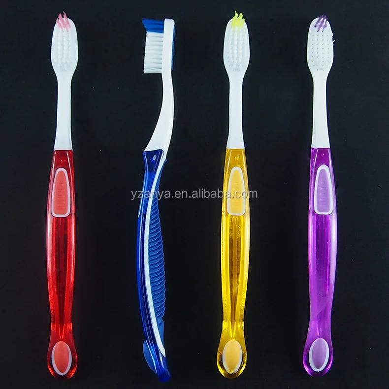 soft rubber handle adult toothbrush with tongue cleaner