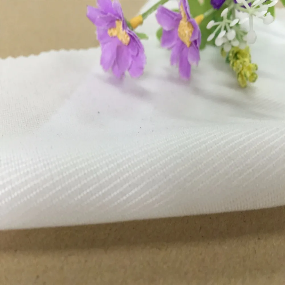 dot fuse woven fusible interlining interfacing fabric for garment by Karl Mayer warp knitting machine