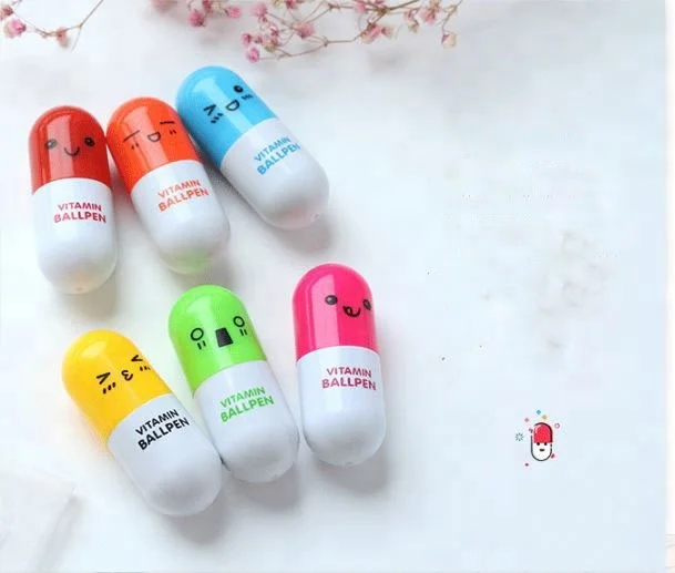 Lovely creative stationery smiling face plastic wholesale novelty pill ballpoint cute pen for gift