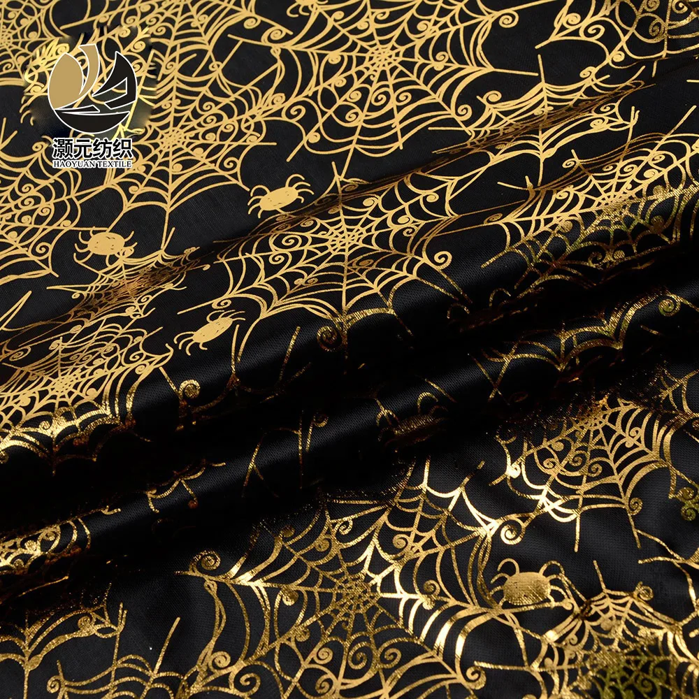 Customized gold shiny printed knitting bronzing fabric with cobweb pattern gold shiny fabric