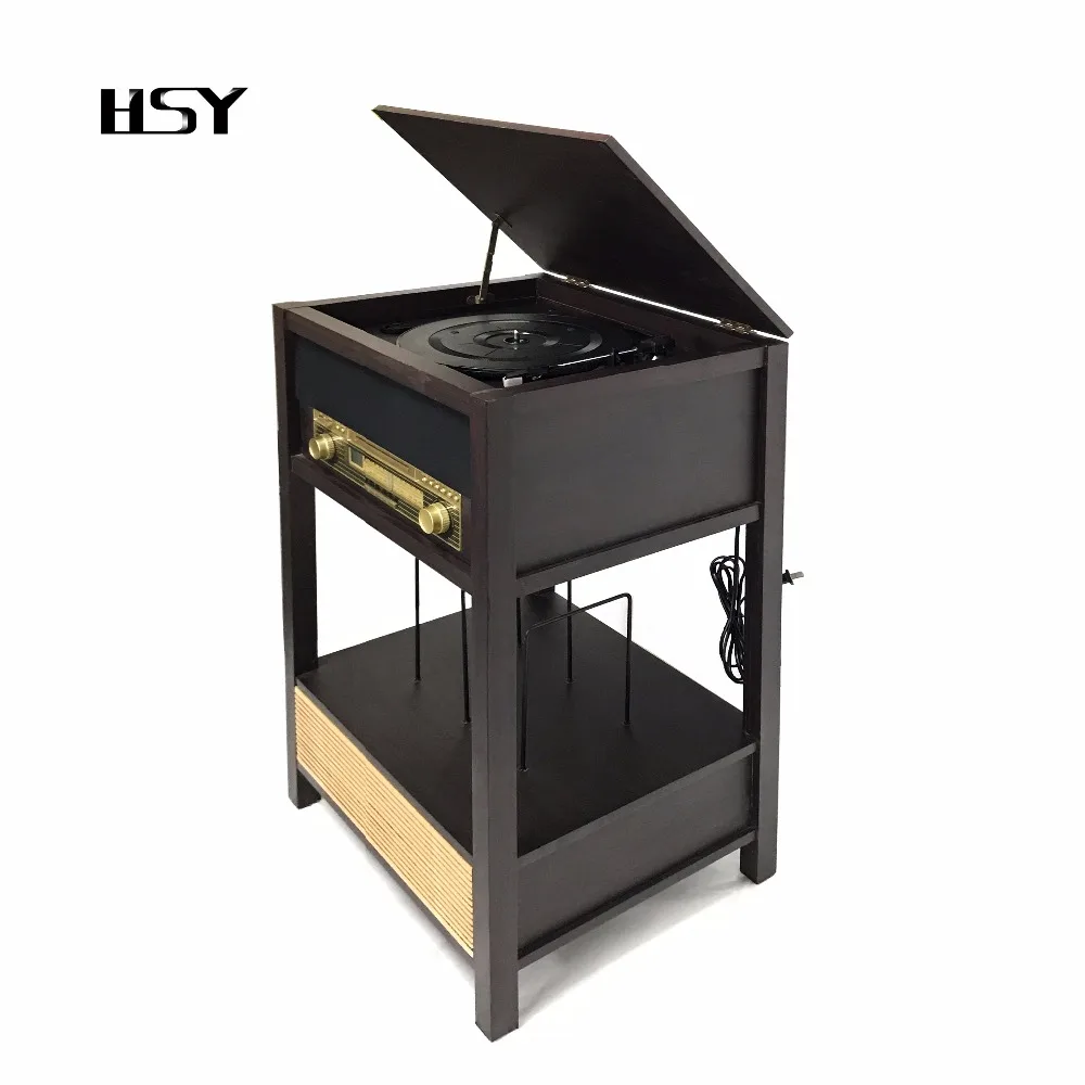 Vintage vinyl record turntable player with disc book shelf AM/FM stereo radio