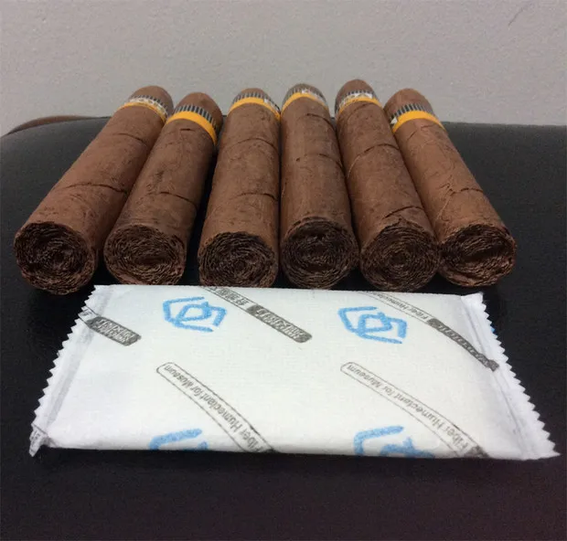 
RH58% 2-way fiber humidity control 50*70mm 8g bag package table with 60% humidity indicator cigar and herb flower 